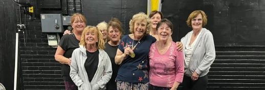 Older women posing in gym